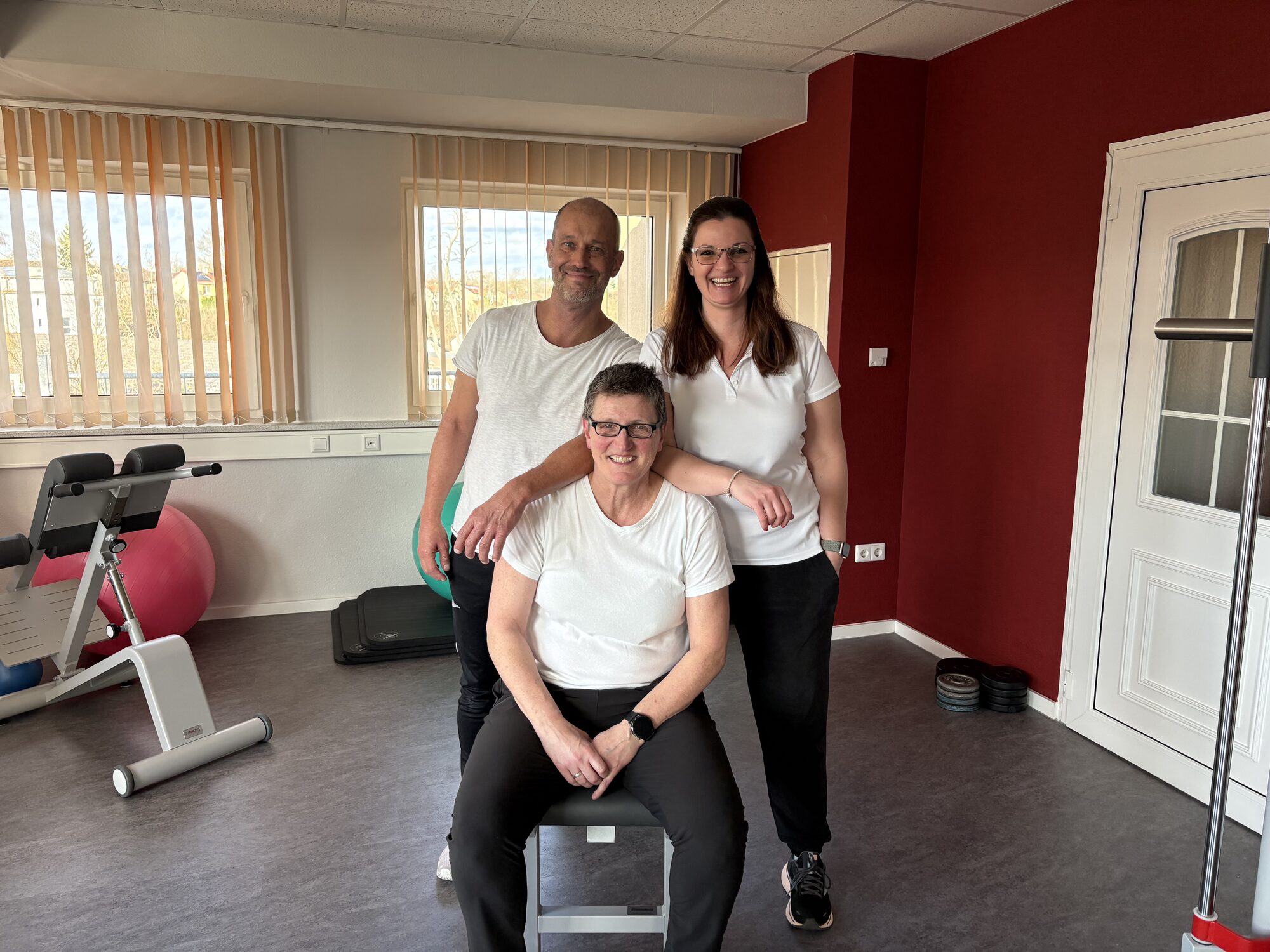 Teamfoto im Trainingsraum